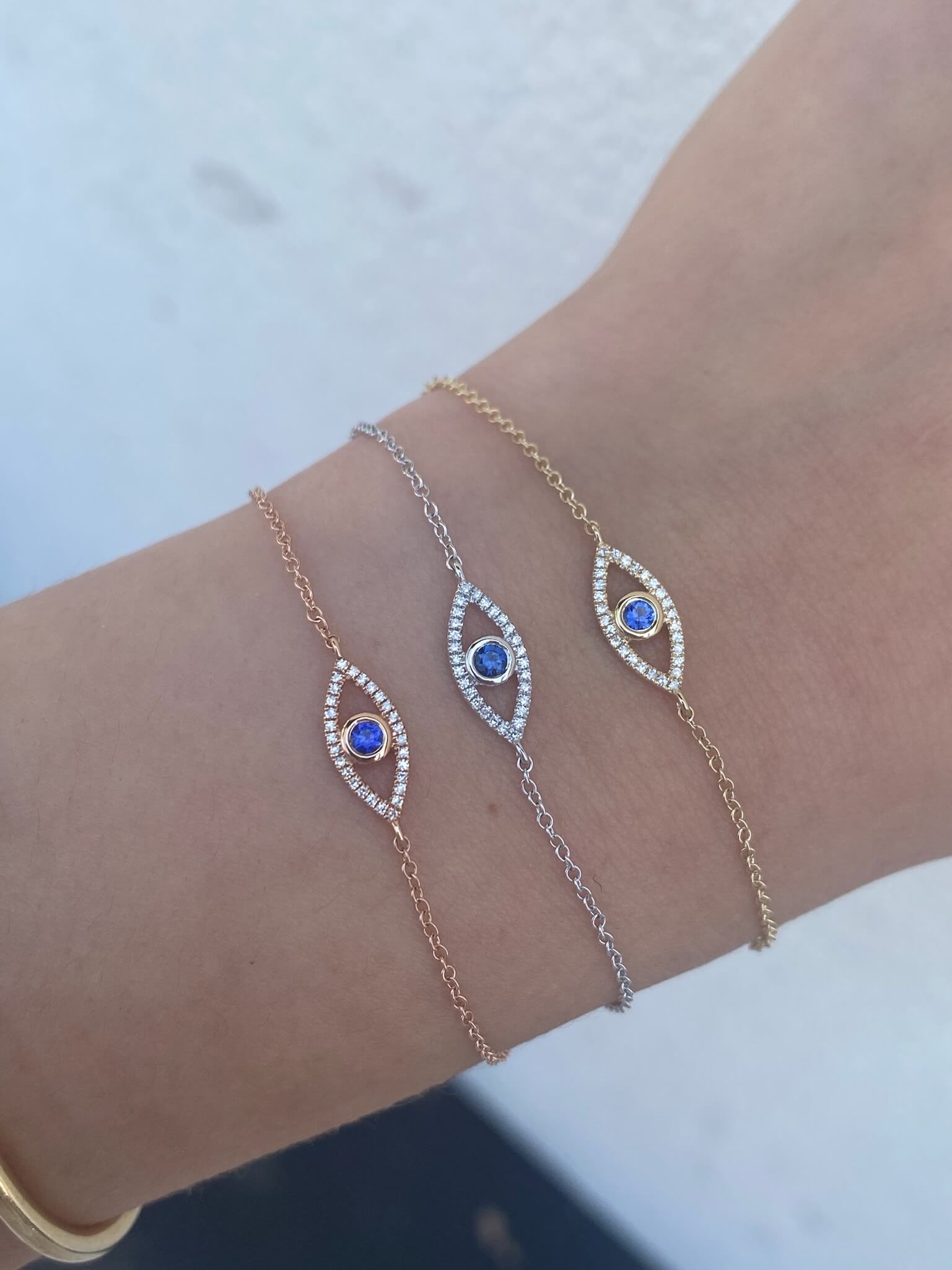 Sapphire Evil Eye Bracelets Available at Moondance Jewelry Gallery